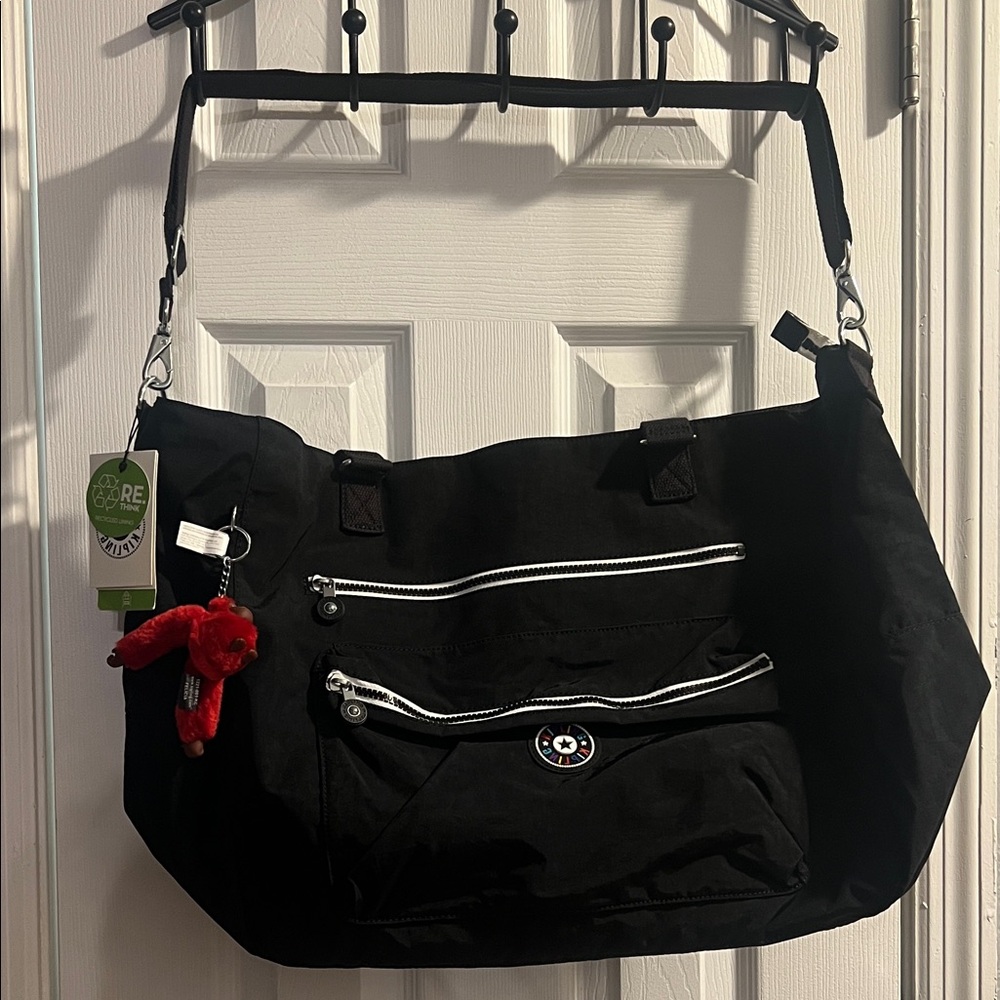 Kipling Black Travel Bag with Red Keychain